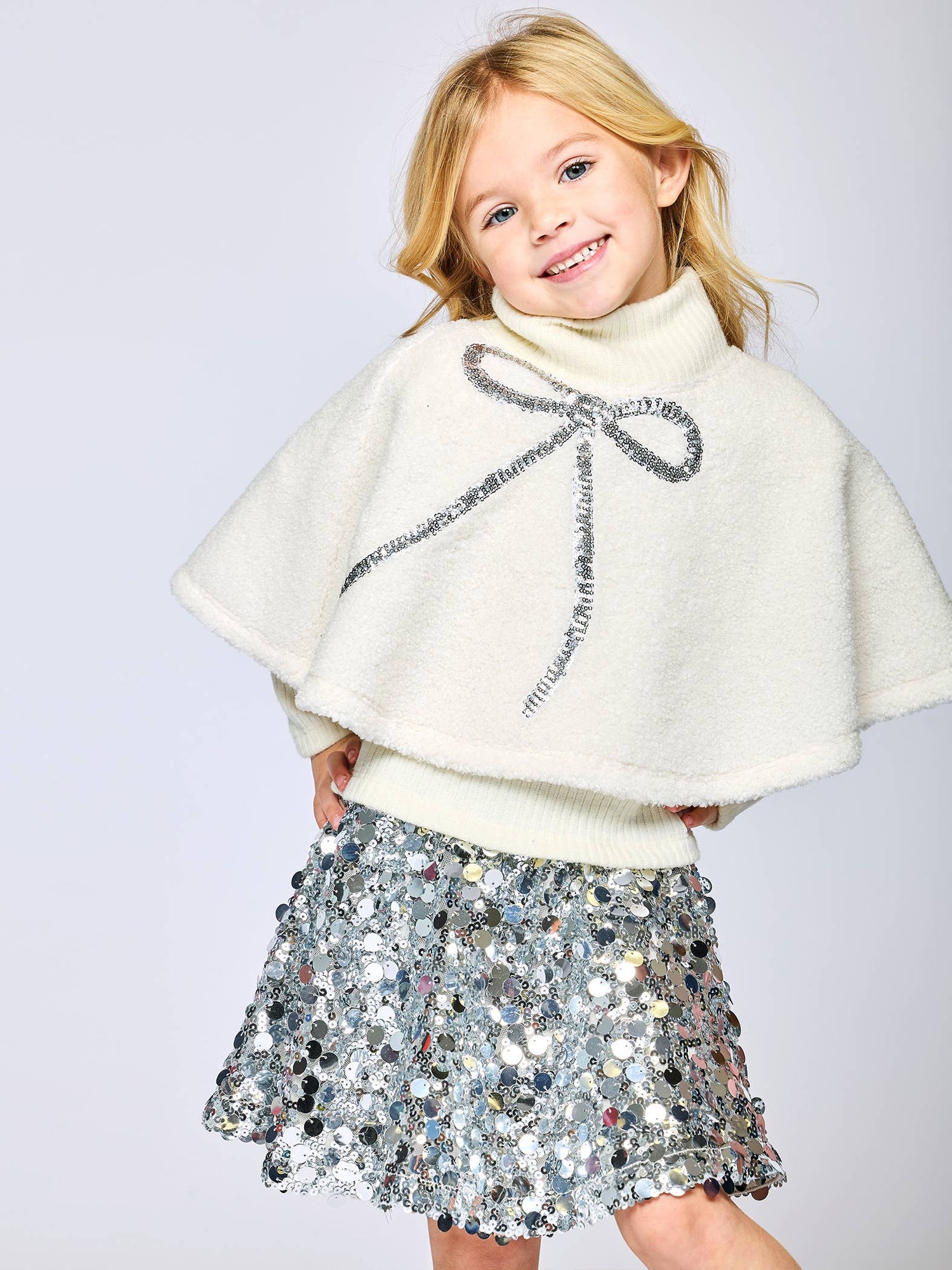 Sherpa Poncho W/ Sequin Bow Detail