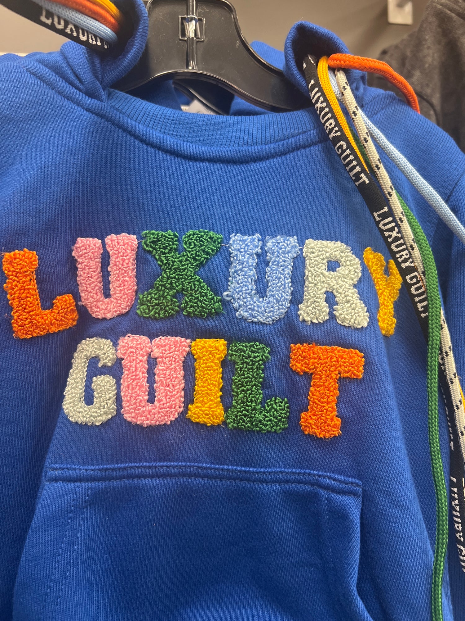 Luxury Guilt Varsity Hoodie